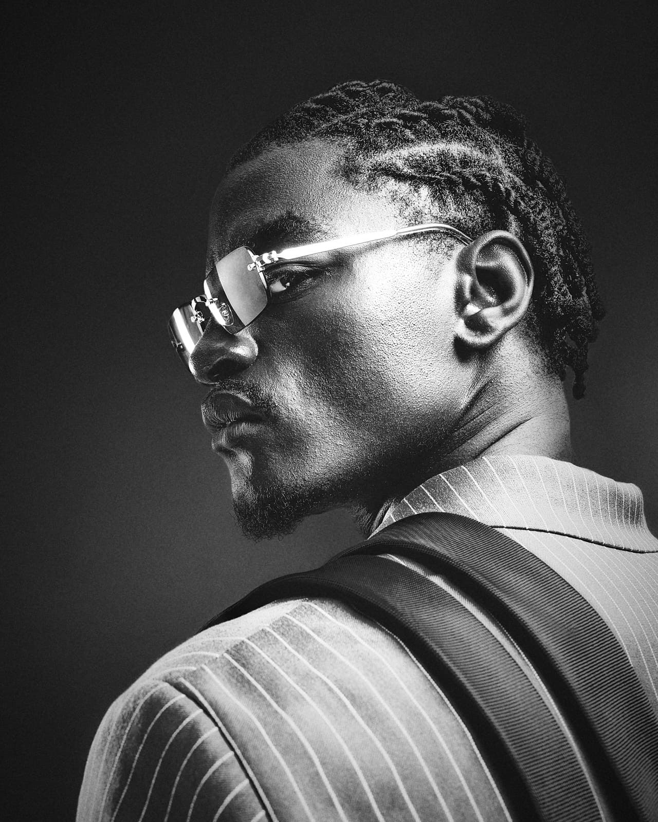 Ibo Bodi — black and white portrait over the shoulder